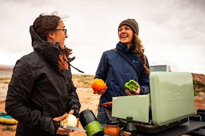 Campers cooking by Lake Powell with the Ignite stove