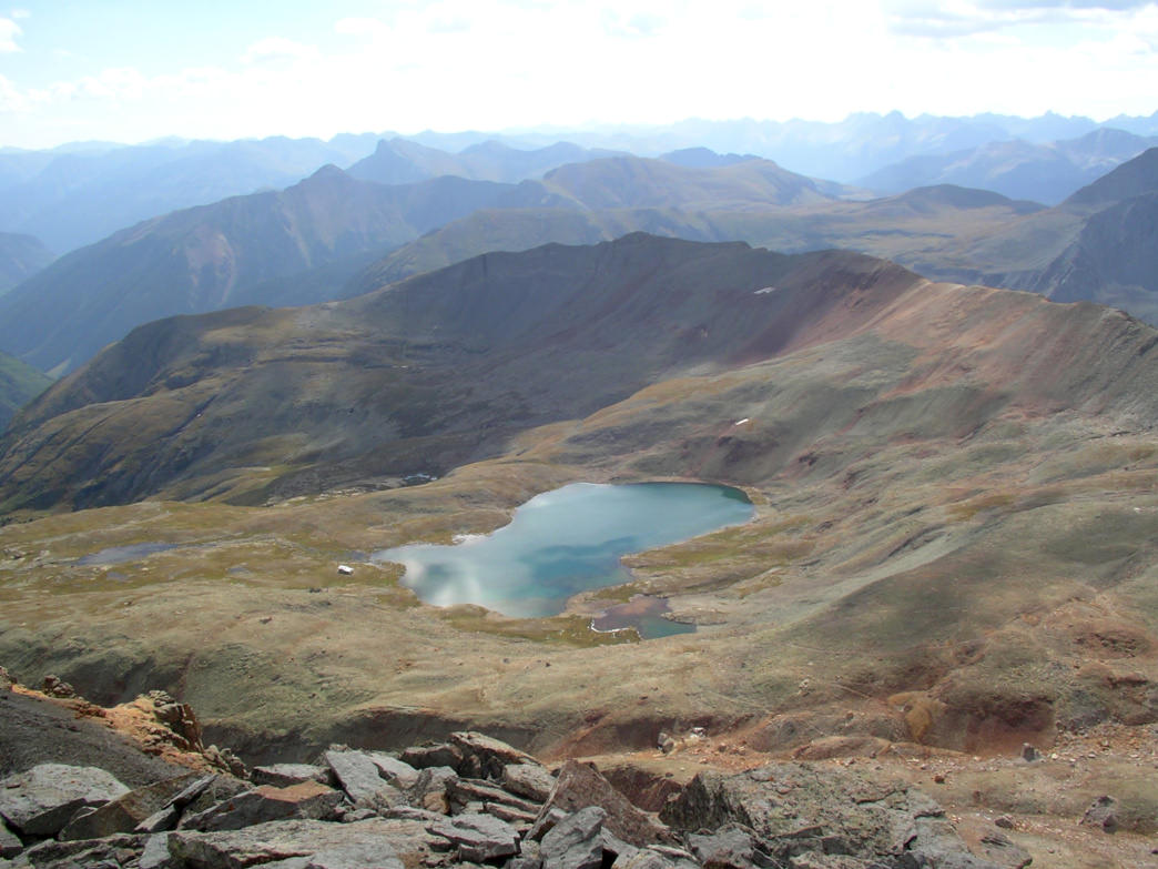 One of the upper feeder lakes and old cabin above Ice Lakes Basin, seen from Golden Horn.
    James Dziezynski