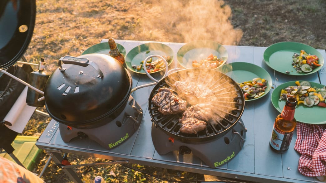 Cooking a delicious meal while glamping