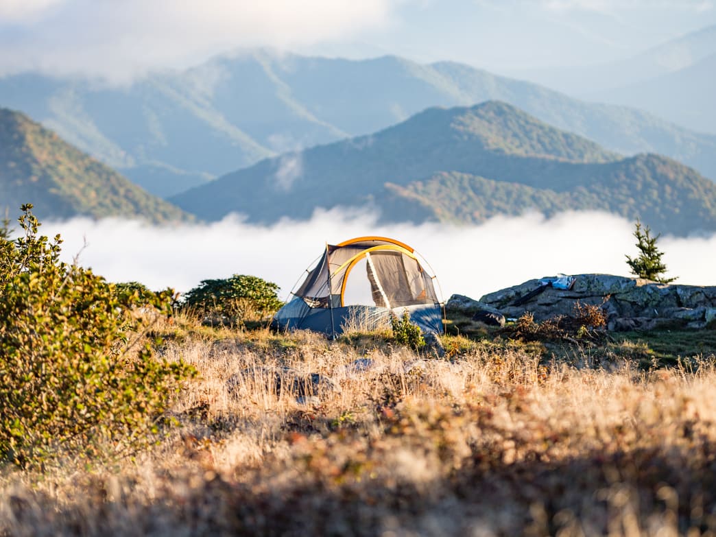 A tent surrounded by beautiful scenery